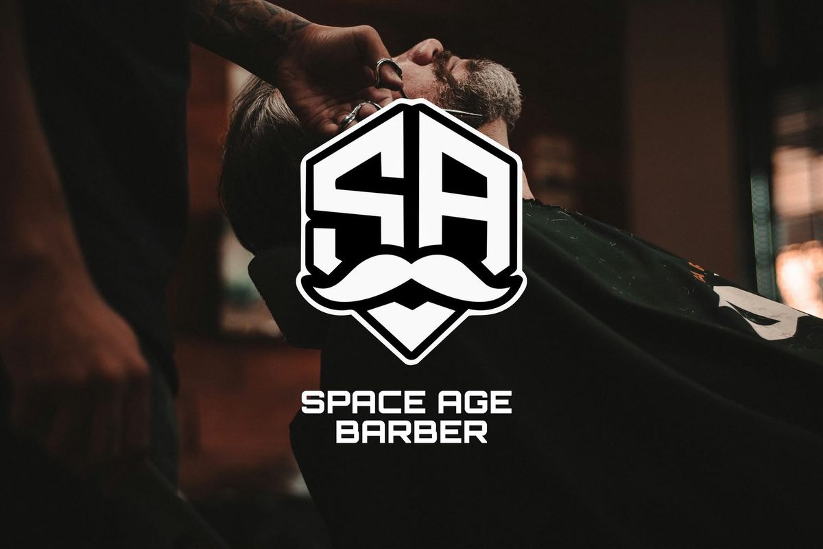 A cut in progress at Space Age Barber